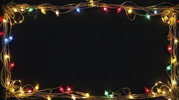 Holiday Lights Frame on Black Background with Colorful Festive Decoration photo
