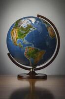 Studying Globe on Wooden Stand Depicting the Americas and World Geography photo