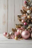 Decorated Christmas Tree with Pink and Gold Ornaments on White Table photo