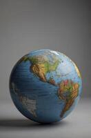Vintage World Globe Featuring North and South America on Display photo