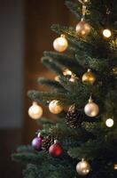Decorating Christmas Tree with Baubles and Pine Cones in Warm Light photo