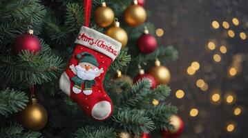 Christmas Stocking Hanging on Decorated Tree with Festive Holiday Ornaments photo