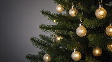 Decorating Christmas Tree with Shiny Ornaments and Fairy Lights Holiday Season photo