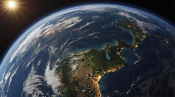 Earth Orbit View with Sun Starburst and Coastal City Lights photo