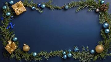 Christmas Garland Frame with Blue Ornaments and Gifts on Dark Blue photo