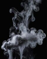 Elegant White Smoke Plumes Rising Against a Deep Black Backdrop photo