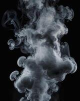 Mysterious Smoke Cloud Flowing Gracefully Against a Black Background photo