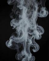 Swirling White Smoke Plumes Against Dark Background for Creative Compositions photo