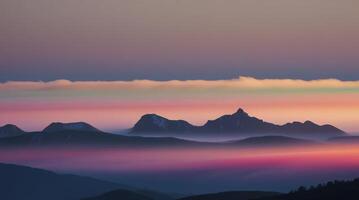 Mountains Emerging From Colorful Fog at Sunrise or Sunset Scenic View photo