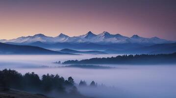 Snowy Mountain Peaks and Foggy Forest Landscape at Dawn Scenery photo
