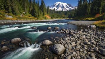 Flowing River and Snowy Mountain Landscape Scene in the Forest photo