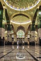 Exploring Hassan Ii Mosque Interior Ornate Dome and Reflective Marble Floor photo