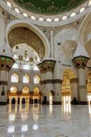 Exploring Interior of Grand Mosque Featuring Arches and Marble Floor photo