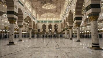 Interior View of a Mosque with Arches and Marble Pillars photo