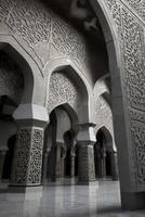 Ornate Archways and Pillars Architecture with Intricate Carvings and Marble Floor photo
