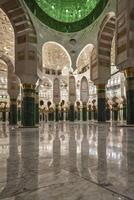 Exploring Grand Mosque Interior with Marble Floor and Impressive Architecture photo
