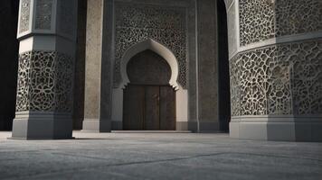 Detailed Islamic Architecture with Ornate Doorway and Decorative Pillars photo