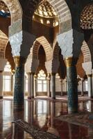 Ornate Islamic Architecture Interior with Arches and Reflected Light photo