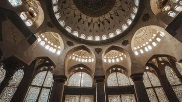 Exploring Intricate Mosque Interior with Dome and Stained Glass Windows photo