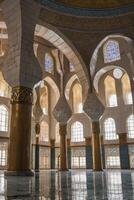 Exploring Interior Architecture with Columns, Arches, and Stained Glass Details photo