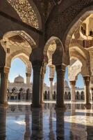 Exploring Grand Mosque Arches and Reflections in Abu Dhabi's Islamic Architecture photo