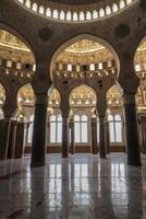 Exploring Grand Architecture Arches Columns and Dome Interior with Marble Floor photo