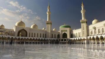 Magnificent Mosque Architecture with Minarets Domes and Reflection on Marble Floor photo