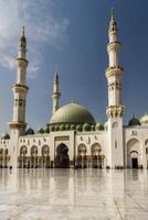 Majestic Mosque Minarets and Dome Against Blue Sky Islamic Architecture photo