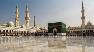 Kaaba at Mecca Grand Mosque with People Pilgrimaging Under Clear Sky photo