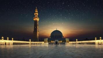 Mosque Illuminated at Night with Stars and Sunset Glow Scenic View photo