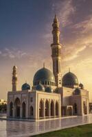 Majestic Mosque Architecture at Sunset with Domes and Towering Minaret photo