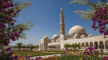 Sultan Qaboos Grand Mosque View with Colorful Flowers in Muscat photo