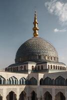 Mosque Dome and Architecture with Islamic Design Under a Cloudy Sky photo