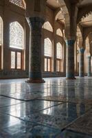 Ornate Interior of a Mosque with Columns and Reflected Light photo
