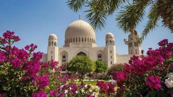 Visiting Sultan Qaboos Grand Mosque with Colorful Flowers in Muscat Oman photo