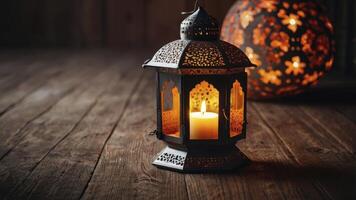 Burning Candle in a Decorative Lantern on Wooden Surface Indoors photo
