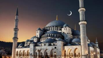 Majestic Blue Mosque at Dusk with Crescent Moon and Star photo