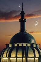 Mosque Dome at Dusk with Crescent Moon and Beautiful Sky photo