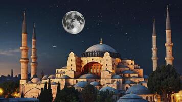 Hagia Sophia Istanbul at Night with Full Moon and Starry Sky photo