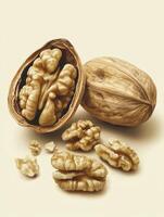 Walnuts Still Life Showing Shelled and Unshelled Nuts on Plain Background photo