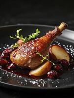 Roasted Duck Leg Confit with Cherry Sauce and Pear Slices photo