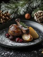 Roasted Duck Leg Garnished with Pears and Cranberries for Holiday Season photo