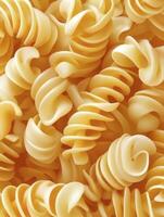 Close-up of Uncooked Fusilli Pasta Creating an Abstract Food Background photo