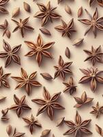 Arrangement of Star Anise Pods and Seeds on Neutral Background Pattern photo