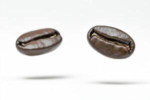 Two Coffee Beans Floating Against White Background for Food and Drink photo