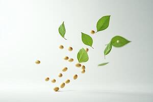 Soybeans and Fresh Green Leaves Falling on a Light Background Still Life photo