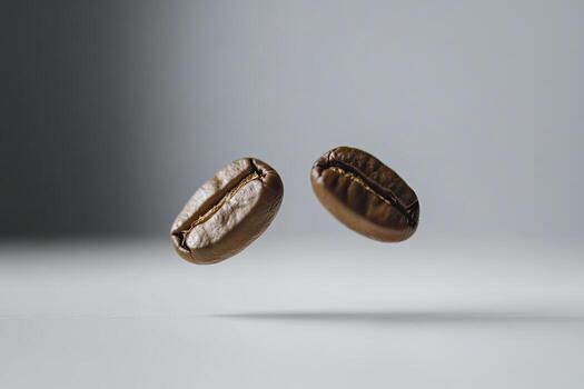 Two Coffee Beans Floating in Air Close Up Studio Shot photo