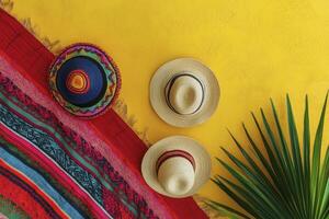 Arrangement of Straw Hats with a Colorful Blanket and Palm Leaf photo