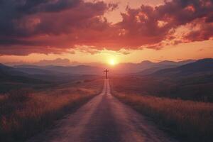 Cross on Distant Hill at Sunset with Path Leading the Way photo