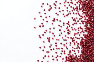Scattered Red Berries Background with White Space for Text or Design photo